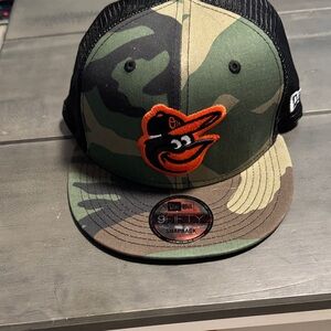 New Era Camouflage Snapback with Orange Logo